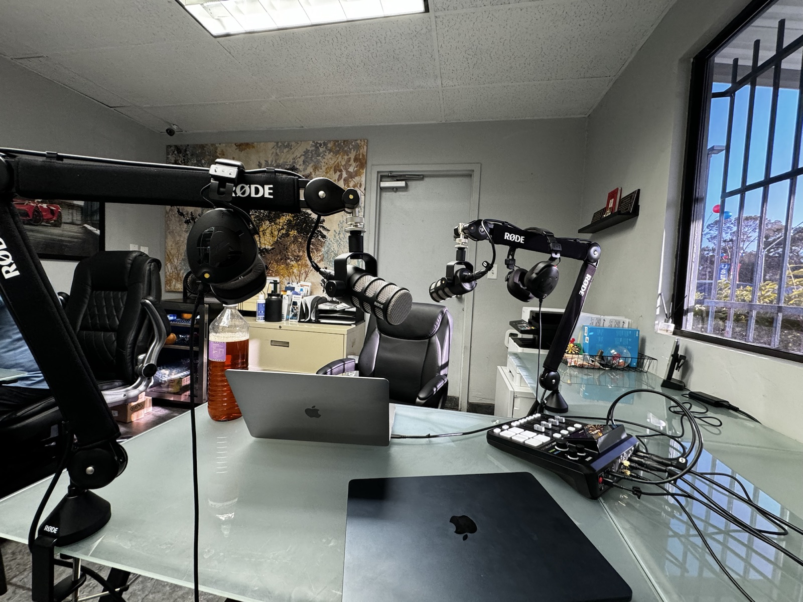 Microphones, headphones, and recording equipment inside the podcast studio